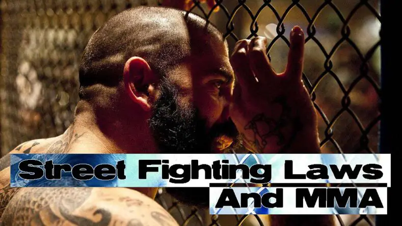 An MMA fighter observing people training.