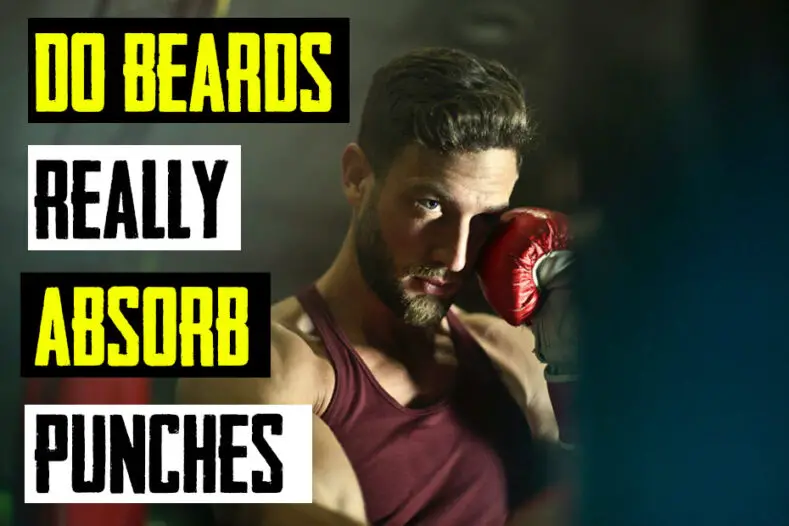 A bearded boxer stands in a boxing ring.