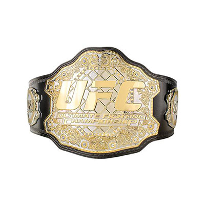 The original UFC championship belt is on display at an event.