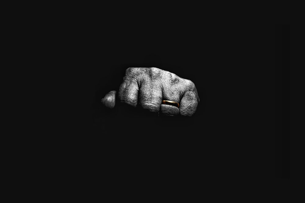 A black and white photo of a fist