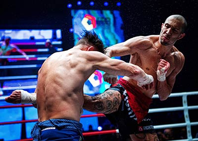 The world Lethwei champion from Canada Dave Leduc landing a hard kick to the body.