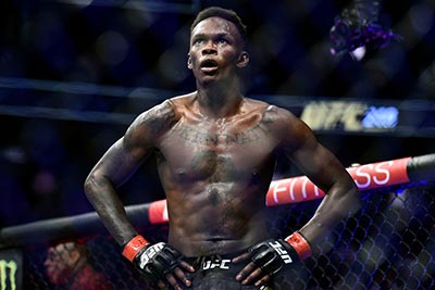 The reigning UFC middleweight champion Israel Adesanya in the octagon.