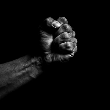 Image of a fist in black and white.