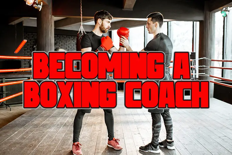 A boxing coach works with a man inside the boxing gym